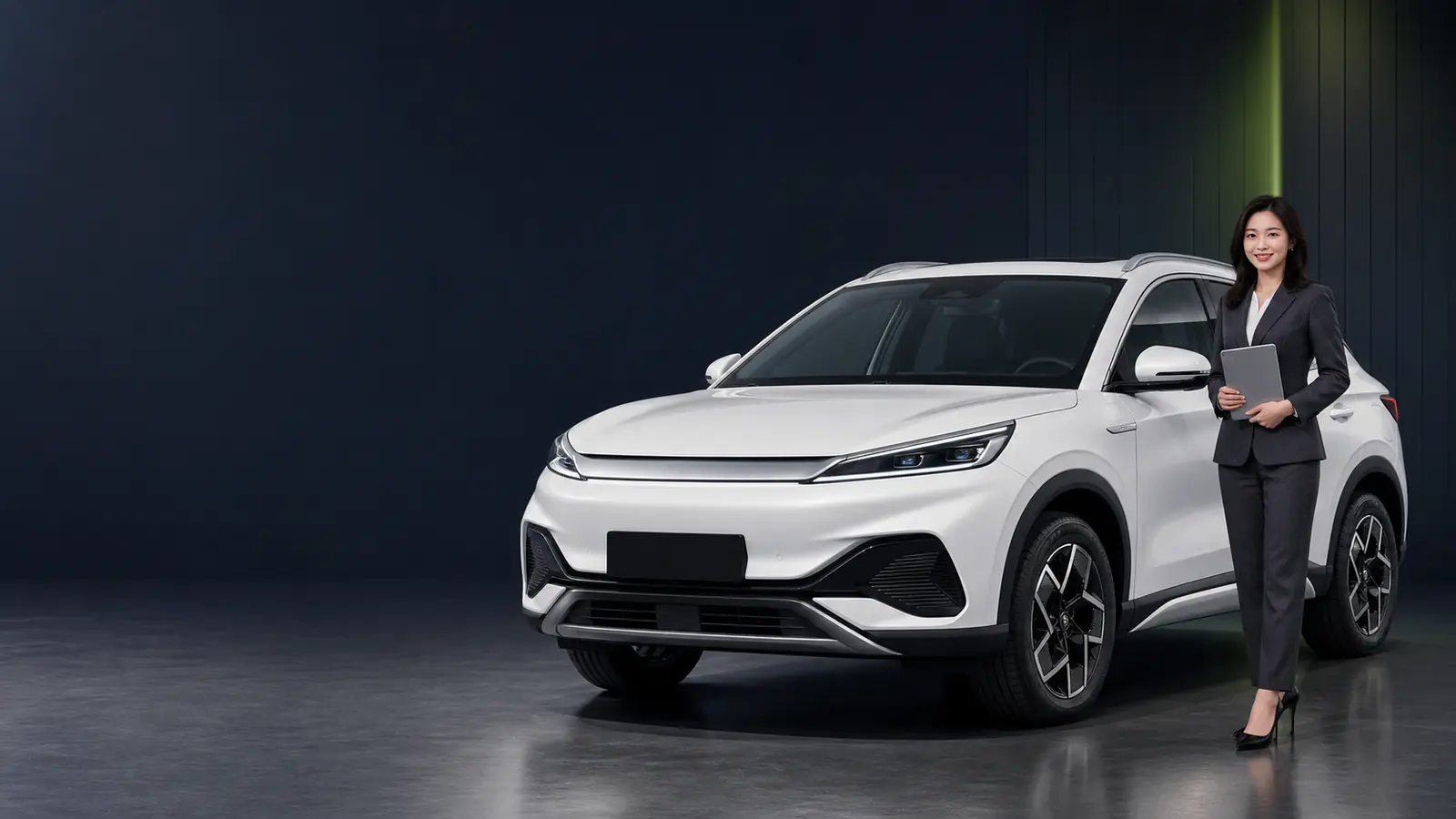 White BYD ATTO 3 electric SUV with a Jerry Auto export adviser